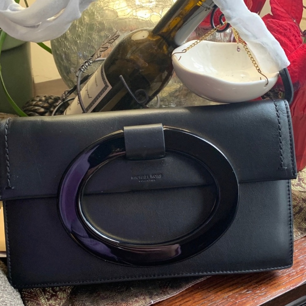 All black Michael Kors collection clutch